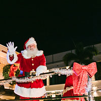 Santa waving to the camera.