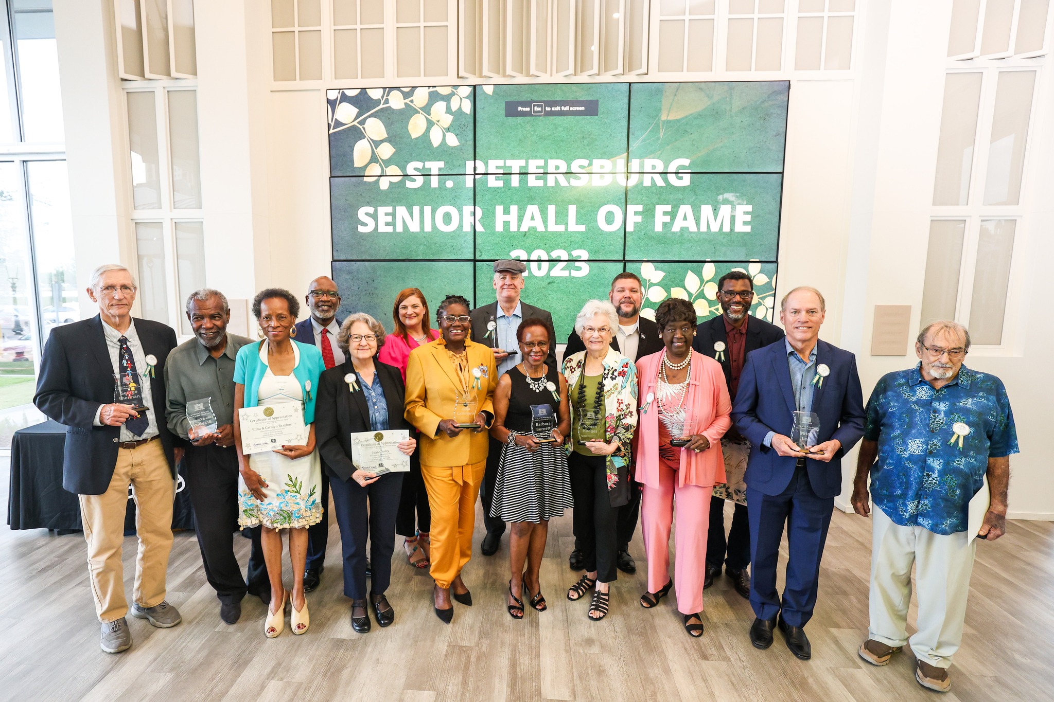 Some of the Senior Hall of Fame inductees from 2019 holding their awards
