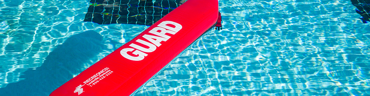 Lifeguard rescue tube floating in the water.