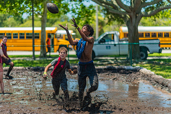Teens Participating at Mud Wars